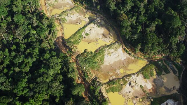 Congo &ndash; 4K Drone Aerial of Gold Mining Industry in Rainforest at Sunset