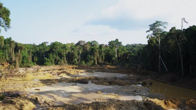 Congo &ndash; 4K Drone Aerial of Gold Mining Industry in Rainforest at Sunset