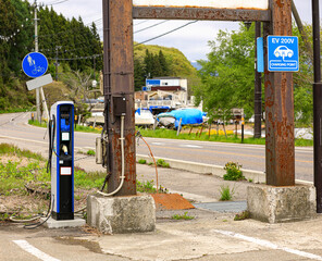 Electric vehicle charging station on service in japan.