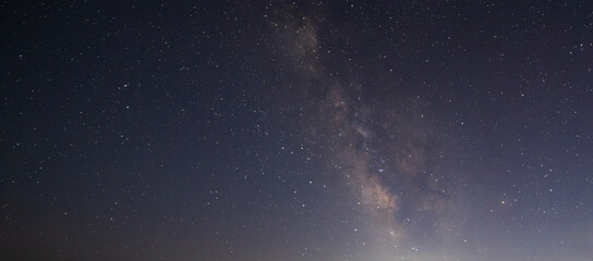 Beautiful bright Milky Way galaxy on the starry sky.  Night sky astronomical background. 