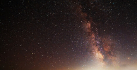 Beautiful bright Milky Way galaxy on the starry sky.  Night sky astronomical background. 