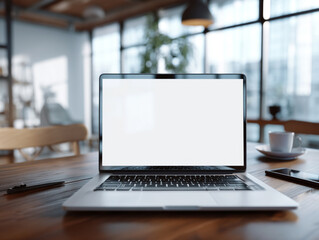Mockup. Workspace with a laptop on a wooden table in a modern office setting during daylight hours