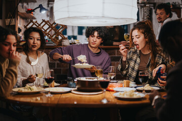 A group of close friends sharing a warm meal together around a cozy dinner table, enjoying each other's company and a lively atmosphere.