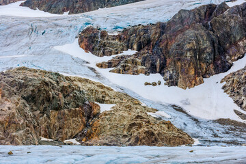 Tranquil iceberg lagoon with drifting ice blocks framed by the vast Patagonian glacier backdrop © Jose