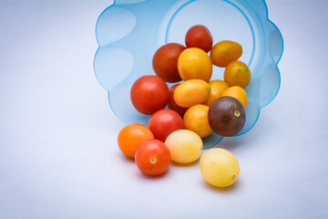 Fresh Cherry Tomatoes on White Studio Background