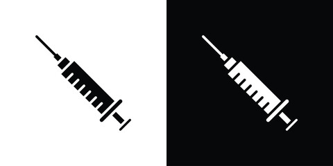 Syringe injection icon. The black silhouette vector