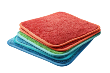 Brightly colored plush towels stacked artistically in a clean, well-lit setting highlight a sense of freshness and home comfort isolated on transparent background