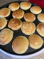 Poffertjes on a cooking plate