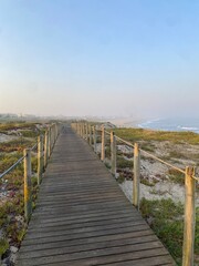 Fototapeta premium Wooden boardwalk on the beach