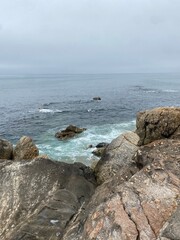 Ocean shoreline on a foggy day