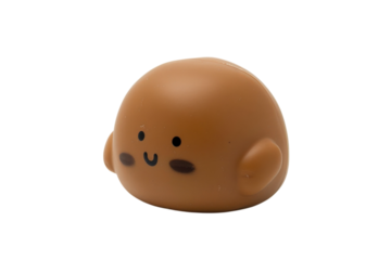 Cute, rounded figure with cheerful expression relaxing on a clean, white surface during a bright, sunny day at home isolated on transparent background