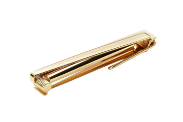 A sleek golden tie clip resting on a clean, white surface, reflecting light elegantly in a minimalist setting isolated on transparent background