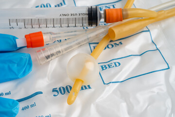 Foley catheter and urine drainage bag collect urine for disability or patient in hospital.