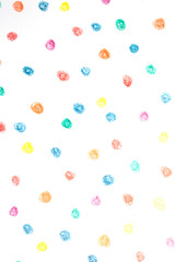 Multicoloured children's pencil crayon spotty polka dots background