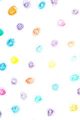 Multicoloured children's pencil crayon spotty polka dots background