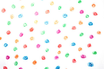Multicoloured children's pencil crayon spotty polka dots background