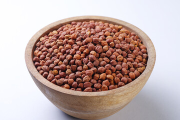 Indian food called Chickpeas or Chana  Harbara Chola Chole Chanu Buta| Konda in wooden bowl isolated on white background 