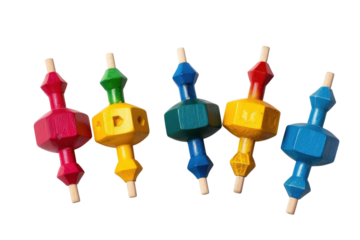 Colorful wooden stacking toys arranged playfully on a white background, inviting creativity and imaginative play for children of all ages isolated on transparent background
