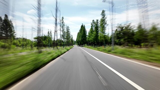 drving through road in countryside,pov