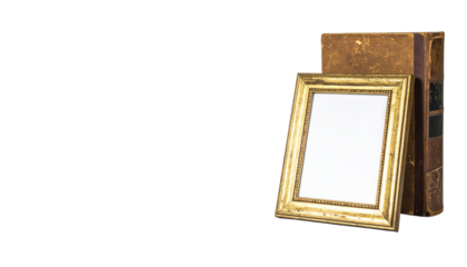 Gold Picture Frame Leaning Against Stack of Old Books.