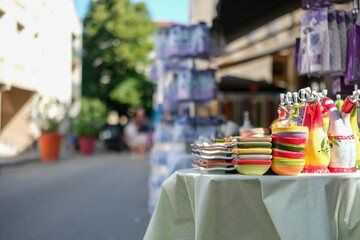 Colorful Provence ceramics at a street market. Traditional local crafts and sustainable tourism....