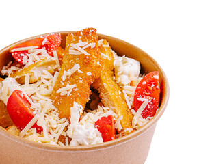 Crispy fries topped with cheese and tomatoes in a serving bowl