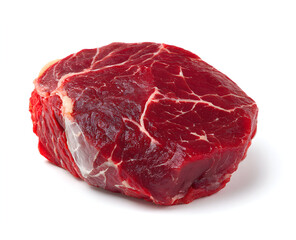 Fototapeta premium Raw beef roast sits on a white surface, showcasing its marbling and vibrant red color, ready for cooking and a delicious meal.