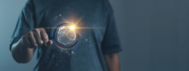 Hand pointing to digital glowing Earth hologram with tech grid background, global technology and communication, innovation and digital transformation data in business.