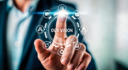 Businessman touching a futuristic holographic interface displaying our vision surrounded by interconnected icons representing business concepts and strategy