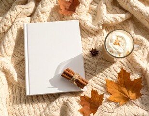 Cozy Autumn Flatlay with Blank Hardcover Book, Cinnamon Sticks and Coffee on Knit Blanket