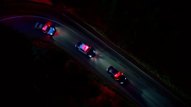 Night police cars with blue red lights chase on road shows law enforcement crime safety speed emergency create tension urban control justice authority public order pursuit excitement pursuit dramatic