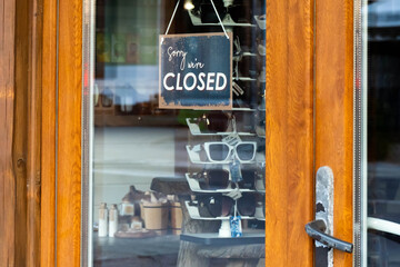 Closed sign at  small business door due the heavy economical crises in Transylvania, Romania.