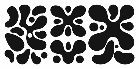Fototapeta premium Abstract black organic shapes and blobs on a white background in a repeating pattern