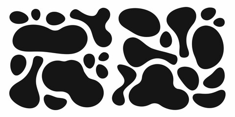 Abstract black and white cow print pattern with organic blobs and irregular shapes