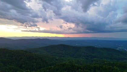 Mountain vista at sunset with stormy clouds