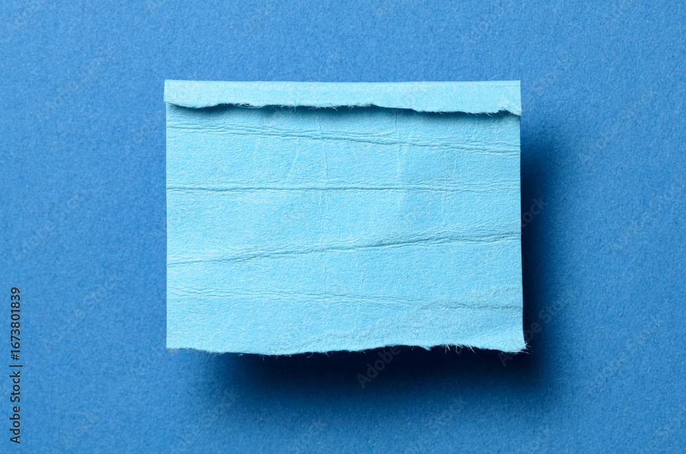 Aufkleber one single torn ripped wrinkled crumpled blank paper note with drop shadow, folded edge and copy spa