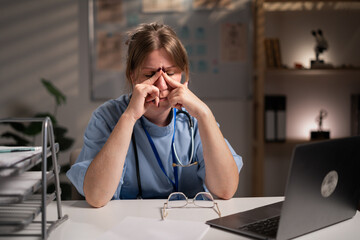 physician nurse diagnosis disease working over hours suffering eyes ache and stress in hospital...