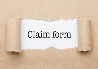 Claim Form text appearing behind torn brown paper