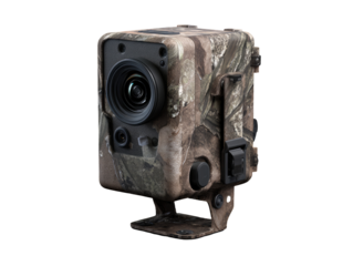 Camouflaged digital camera.  Small, square, rugged housing.  Lens visible, with other electronic components.  Dark background.  Outdoor, wildlife