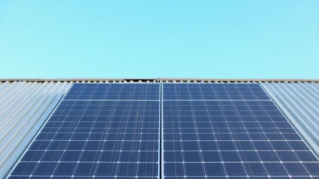 Solar Panel on Rooftop Under Blue Sky