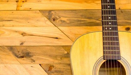 Obraz premium Acoustic guitar on wooden wall