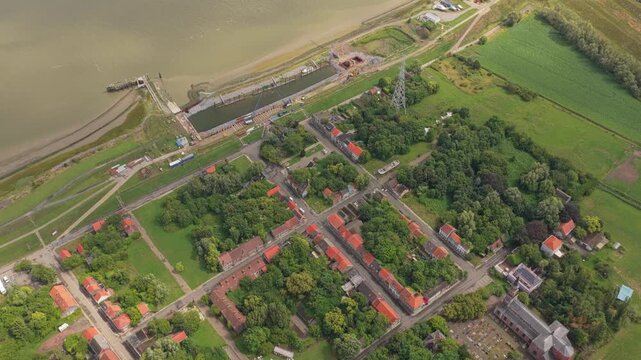 Doel ghost town aerial with derelict homes and empty blocks, Belgium