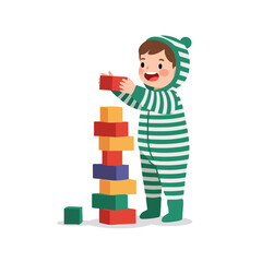 A smiling little boy plays with colorful blocks