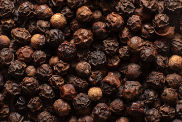 close up of black peppercorns 