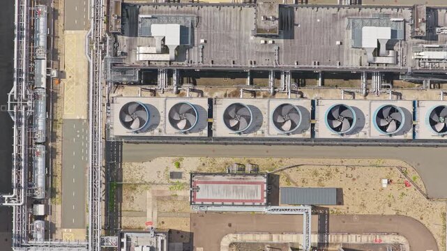 Internet infrastructure hub, data building with cooling towers, aerial capture