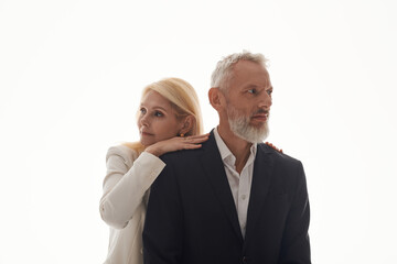 Cherishing moments together, a stylish couple celebrates love and connection in timeless fashion