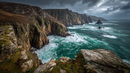 Fototapeta premium Stormy coastline cliffs waves