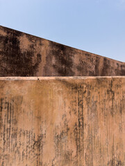 textured old walls and blue sky