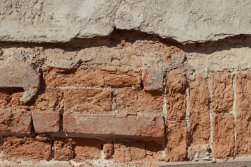 Texture of an old weathered brick wall