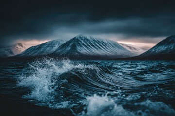 Fototapeta premium Stormy Arctic seas crash against snow-capped mountains
